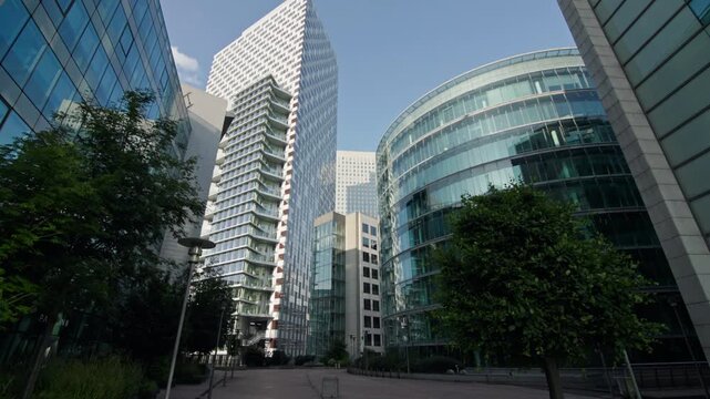 Beautiful architecture of the business district of Paris Courbevoie. Glass skyscrapers in the downtown of the city.