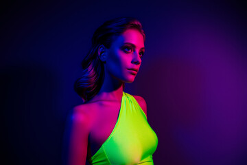Neon styled portrait of a young woman with vivid colors and dramatic light effects