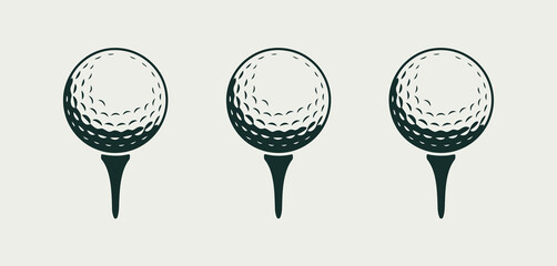 Three dark green golf balls on tees arranged in a row on a light background
