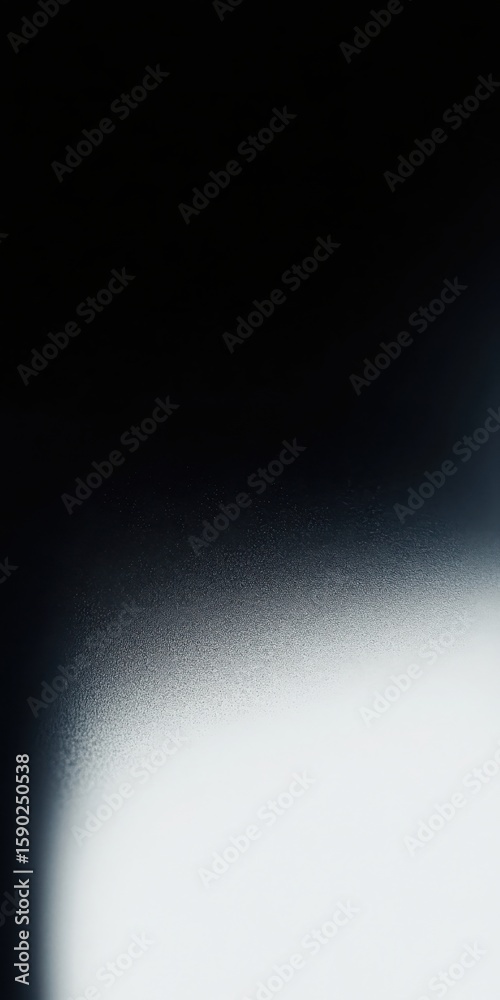 Poster bright light shining up from corner on dark grainy background. abstract texture with gradient effect