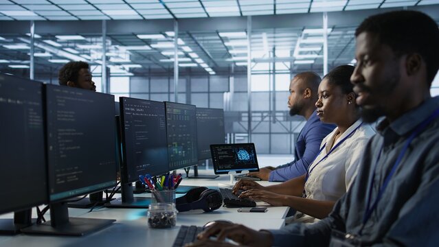 Woman putting headphones on in server room, developing disaster recovery plans ensuring minimal downtime. Engineer listening music in data center, using data analytics to monitor performance, camera A - Powered by Adobe