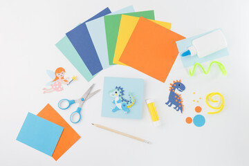 Creative top-down arrangement of colorful craft supplies for kids DIY branding, toy company product displays, arts education visuals, and stationery catalog layout or social media content,