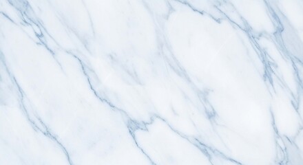 Close-up of a light blue and white marble surface, showcasing intricate veining patterns and a smooth, polished texture.