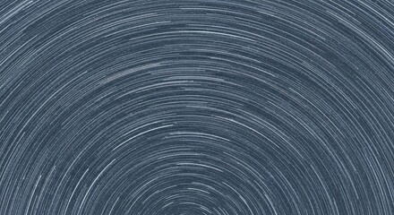Circular star trails captured during a long-exposure night sky photograph.