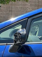 Damaged drivers mirror