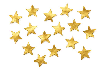 Metallic gold foil stars forming heart-shaped pattern against transparent backdrop