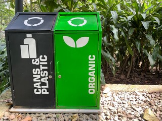 Outdoor Waste Management Station for Cans, Plastic, and Organic Materials.

