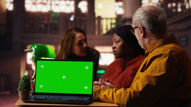Adult performers focused on role preparation with chroma key screen for a classic drama play. Rehearsal session combines storytelling and cultural expression through dramatic arts. Camera B.