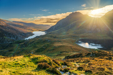 Ogwen Valley at sunrise with Tryfan peak and Ogwen and Llyn Idwal lakes. North Wales. Snowdonia. UK