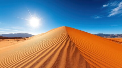 Sunlight dances on the vibrant dunes of Sossusvlei in Namibia