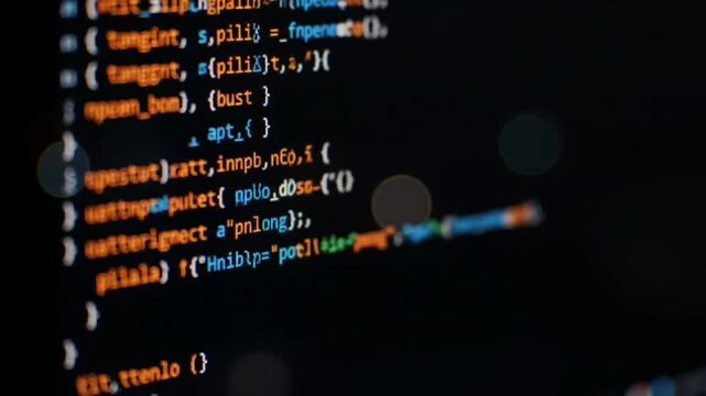 Computer Coding Script with Orange White and Blue Text on Dark Background