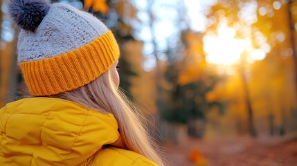 Woman enjoys serene autumn moments in the peaceful Austrian woods