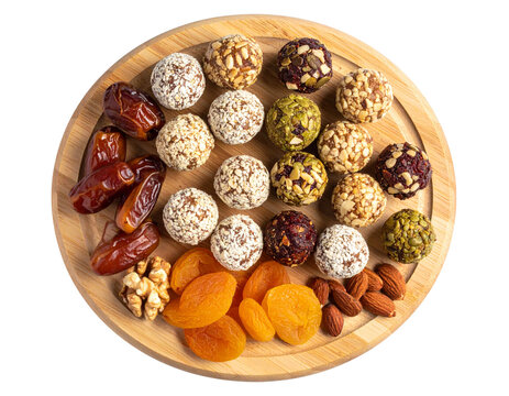 Top-Down Flat Lay of Assorted Sugar-Free Date-Based Vegetarian Truffles, Isolated