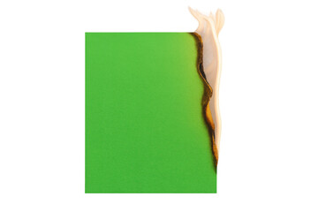 Green screen paper burning, flames consuming surface, creating dramatic visual effect against transparent backdrop