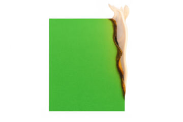 Green screen paper burning, flames consuming surface, creating dramatic visual effect against transparent backdrop