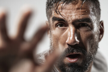 Obraz premium dynamic portrait of handball player in action captured in left side of frame with intense expression on their face