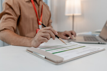 Fototapeta premium businessman is working in his private office, marketing manager works with a lot of paperwork, an employee is working for company, finance manager is in the office
