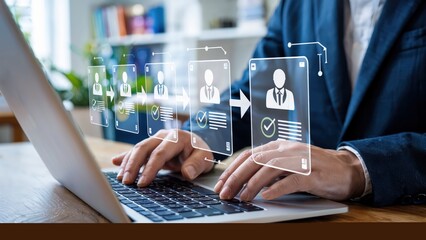 Recruiter using laptop for online job recruitment process