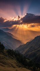 Majestic sunbeams break through the clouds over a serene mountain valley at sunset