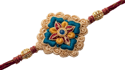 A beautifully crafted rakhi with intricate floral embroidery in blue, gold, and red, featuring a central gemstone. Isolated on transparent background. PNG, cutout.
