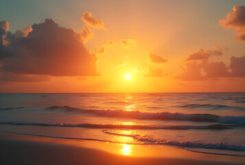 Obraz premium sunset over a calm sea, golden and orange tones filling the sky