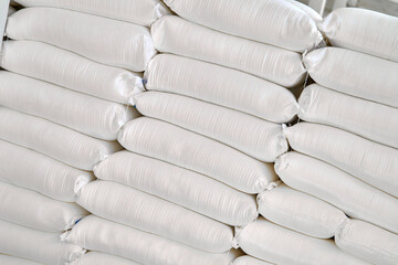 Flour sacks stored in neat rows at the storage facility during day time