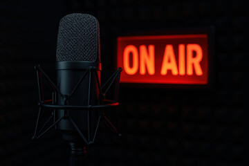 Professional podcast microphone and glowing on air sign in modern recording studio for live broadcast or online radio sessions