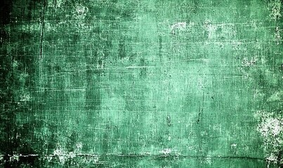 Obraz premium An abstract image featuring a textured teal background with various scratches and discolorations, creating a vintage or distressed aesthetic