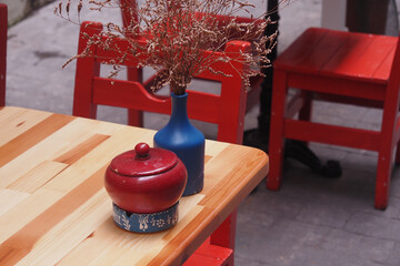 Colorful dining table with decorations in an outdoor setting