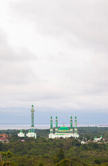 The Al Faruq Grand Mosque, seen from a distance with the surrounding government center, is the largest mosque in Sangatta, East Kutai Regency, East Kalimantan, and is also an Islamic center.