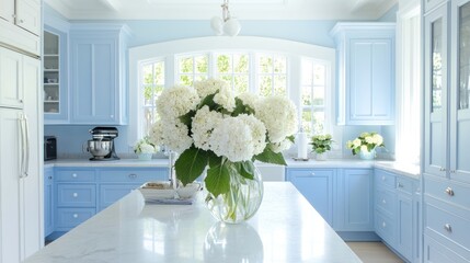Light blue kitchen with white hydrangeas