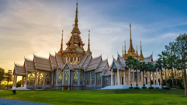 Timelapse of Wat Non Kum or Wat Luang Pho To in Sikhio District, Nakhon Ratchasima, Korat, Thailand is a symbolic place of temples in Thailand. At sunset, there is a reflection in the water.