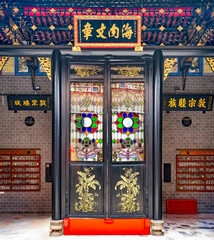 Historic Chan She Shu Yuen Ancestral Hall, Kuala Lumpur, Malaysia. Ornate entrance with stained...