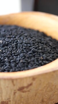 black cumin seed oil on a table 