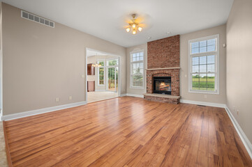 Empty Living Room with Fireplace and Natural Light