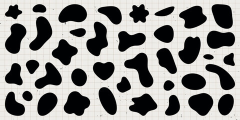 Abstract shapes on a background. Organic shapes, varied forms, and unique patterns. Repeated abstract shapes create a modern, artistic look. Black shape vector set.