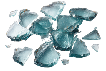 Scattered shards of teal-colored glass, various shapes and sizes