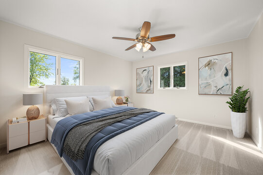 Modern staged bedroom with clean design and natural lighting