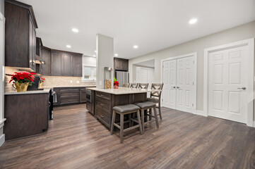 Bright modern kitchen with sleek island and stainless steel appliances