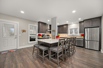 Bright modern kitchen with sleek island and stainless steel appliances