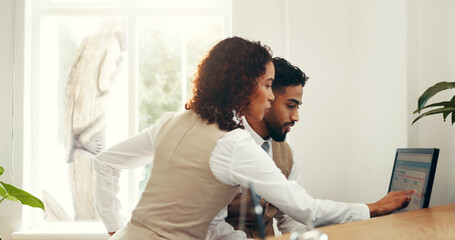 Hotel, receptionist and colleagues with computer, collaboration and research for reservation on...