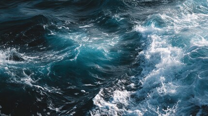 Fototapeta premium A captivating view of ocean waves, showcasing the beauty and power of nature in vivid blue hues and dynamic movement.