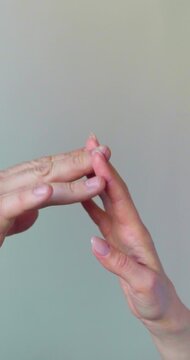 Experience the profound connection of human touch as a female and male hand lightly brush against each other, fingers gently intertwining. Essence of intimacy unity - power of touch in forging bonds.