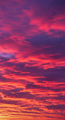 Fototapeta premium Vibrant Sunset Sky with Fiery Red and Purple Clouds
