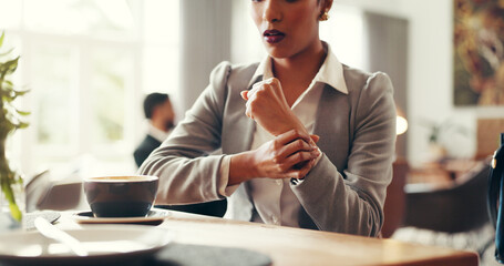 Business, wrist pain and woman in cafe, joint injury or carpal tunnel syndrome with burnout....