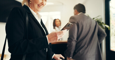 Business, woman and phone at hotel reception for check in, reservation and booking confirmation....