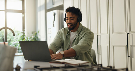 Man, headset and laptop in kitchen for remote work, typing and advice for customer care call...