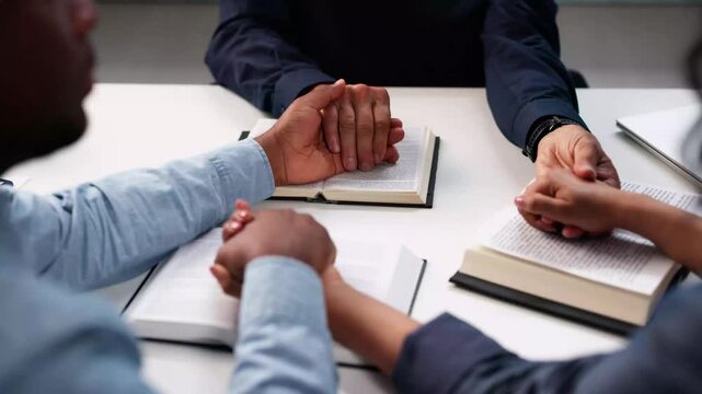 Diverse Group Of Christian People Praying Together