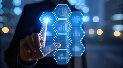 Businessman touching a futuristic holographic interface with digital data and icons