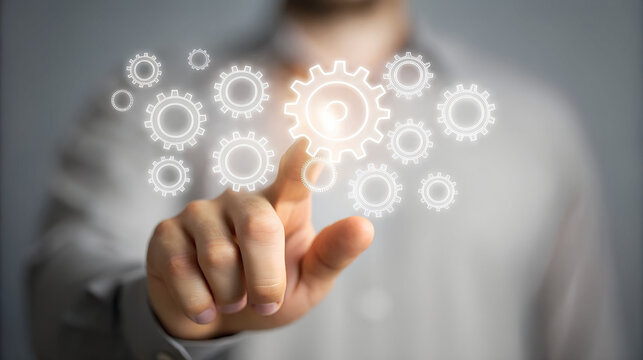 Man s finger touching glowing digital gears on a futuristic interface